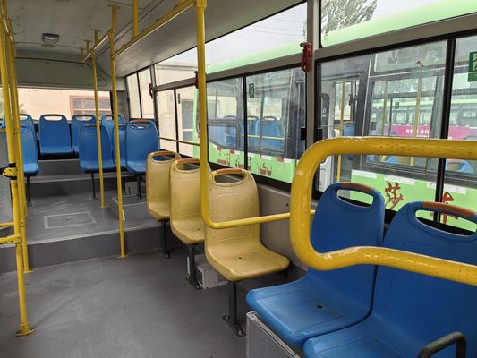 A second-hand 8-meter left-hand drive green diesel bus