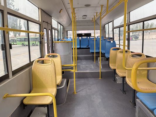 A second-hand 8-meter left-hand drive green diesel bus