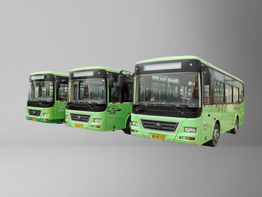 A second-hand 8-meter left-hand drive green diesel bus